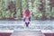 Young yogi  girl  on the pier of a beautiful lake.  Concept of healthy life and natural balance