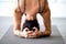 Young yogi sporty woman practicing yoga, doing salamba sirsasana