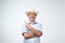 Your advertising here. Studio portrait of handsome senior man in blue shirt and cowboy hat showing copy space