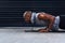 Your body wont go where your mind doesnt push. a sporty young man doing push ups.