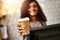 Your cup of magic is ready. Portrait of a young barista holding a cup of coffee in a cafe.