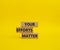 Your Effort Matter symbol. Wooden blocks with words Your Effort Matter. Beautiful yellow background. Business and Your Effort