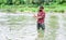 Your Favourite hobby. bearded fisher in water. hobby and sport activity. fisherman show fishing technique use rod