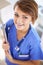 Your health is in good hands. Portrait of an attractive young doctor in scrubs holding a clipboard.