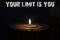 Your limit is you - white candle with dark background - in a woo