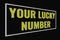 Your Lucky Number yellow text on dark screen