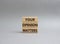 Your opinion matters symbol. Wooden blocks with words Your opinion matters. Beautiful grey background. Business and Your opinion