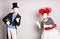 Your text here. Colorful studio portrait of mimes with gray background. April fools day