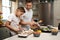 Youre such a natural. Cropped shot of a young boy helping his father cook in the kitchen.