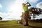 When youre swinging, youre winning. a couple playing golf together on a fairway.