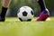 Youth Football Background. Young Boy Wearing Soccer Cleats and Soccer Socks