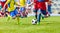 Youth football soccer match. Kids playing soccer game on sport field