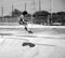 Youth Skateboarding in Black and White