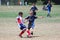 Youth Soccer Football Players Fight for the Ball