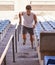Youve got to push hard to win. Shot of an athlete running up a flight of stairs as part of his training.