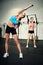 Youve gotta reach for your fitness goals. Full length shot of two young women working out in the gym.