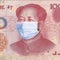 Yuan banknote with Mao Zedong in a medical mask. Chinese coronavirus concept. Coronavirus Wuhan Sars illness.