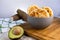 Yucca bread with avocado on Wood background