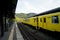 Yufuin, Japan - May 13, 2017 :Yellow color vintage train diesel car of JR Kyushu Railway Company stopped at train station