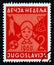 YUGOSLAVIA - CIRCA 1960: A stamp printed in Yugoslavia from the `Children`s Week` issue shows Girl`s head and toys, circa 1960.