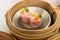 Yumcha, various chinese steamed dumpling in bamboo steamer in chinese restaurant. Dimsum in the steam basket, Hong kong local food