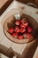 Yummy strawberries in the sun on a hot sunny day