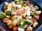 Yummy vegetarian dish in the pan : potatoes, veggie meatball and brocolis.