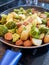 Yummy vegetarian dish in the pan : potatoes, veggie meatball and brocolis.
