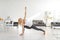 Yuong woman sitting on the floor in yoga pose