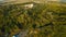 Yurovichi, Belarus. Aerial View Of Jesuit Collegium Complex. Top View Of Parking Lot Of Primitive Man Upper Period Of