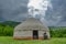 Yurt on the background of the mountain. Overcast weather. Summer season.