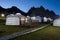 Yurt camp at night, rocky mountains in the background. Ger campsite in rural Mongolia