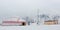 Yurt standing in the snow with motorcycle in front of it, Mongolia