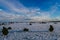 YURYEVETS, RUSSIA - MARCH 27, 2019: Men fishermen fishing in winter on the ice