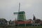 Zaanse Schans at dawn - Windmill and wooden houses - Netherlands country side - Holland tourism