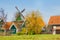 Zaanse Schans village, Holland, green houses against blue sky