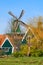 Zaanse Schans village, Holland, green houses against blue sky