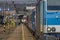 Zabreh station with passenger and cargo trains in sunny day