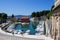 Zadar, Croatia; 07/17/2019: Lucica Fosa Zadar harbour full of boats with the Gate of Terraferma or Gate of Zara at the