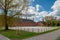 Zagare manor red brick stables on a sunny spring day, Lithuania