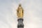 Zagreb, Croatia - Aug 10, 2020: Virgin Mary golden column in front of Zagreb Cathedral at sunset hour