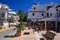 ZAHARA DE LOS ATUNES COSTA DE LA LUZ, SPAIN - JUNE, 19. 2016: View on the main road of the village center with tourist