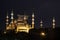 `Zakat increases and protects wealth` lettering hanging on Blue Mosque`s mahya in Istanbul,Turkey.