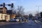 ZAKOPANE, POLAND - JANUARY 06, 2016: Winter urban cityscape with cars on the road and crosswalk in center of Zakopane in sunny day