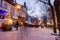 ZakopanÑƒ town  - winter polish resort in.  blue hour , twilight. Blurred figures of people. Christmas   holiday Illuminated