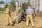 ZAMBERK, CZECHIA - SEPTEMBER 15, 2018: Firefighters wearing traditional uniforms with a steam pumper fire engine in the