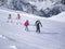Zams, Austria - 22 Februar 2015: Ski resort. Children with instructor skiing and practicing the correct moves on slope in Alps.