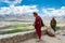 ZANSKAR, INDIA - JULY 15, 2015 : Untitled lama waiting for mystical mask dancing at Karsha Monastery (one of the oldest monastery