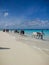 Zanzibar, Tanzania - December 4, 2019: Nungwi beach in Zanzibar, blue sea and blue ocean, on a beautiful tropical beach. Young