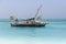 Zanzibar, Tanzania, January 18, 2021: A Tanzanian-flagged fishing boat moored against the backdrop of the azure sea